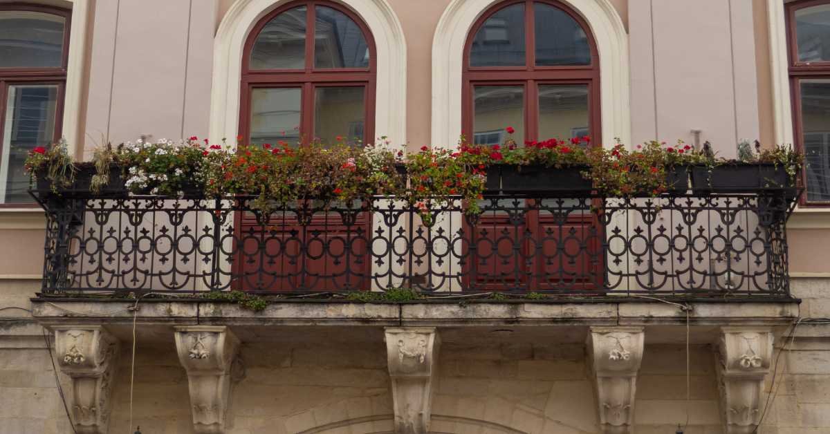balcony plants along railing and walls not center